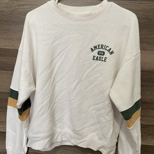 American Eagle White Crewneck Sweater Size Large Green yellow Striped sleeve